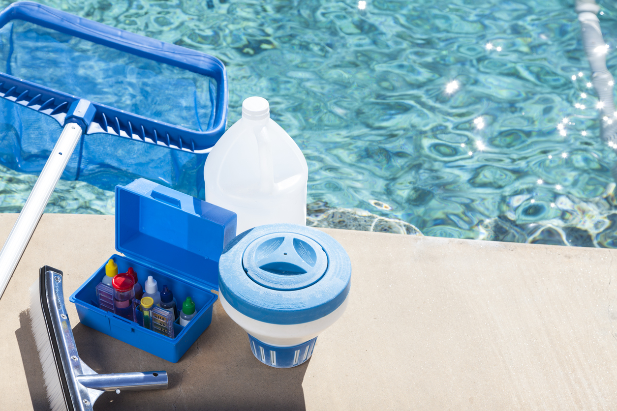 Local swimming pool contractor providing pool cleaning services.